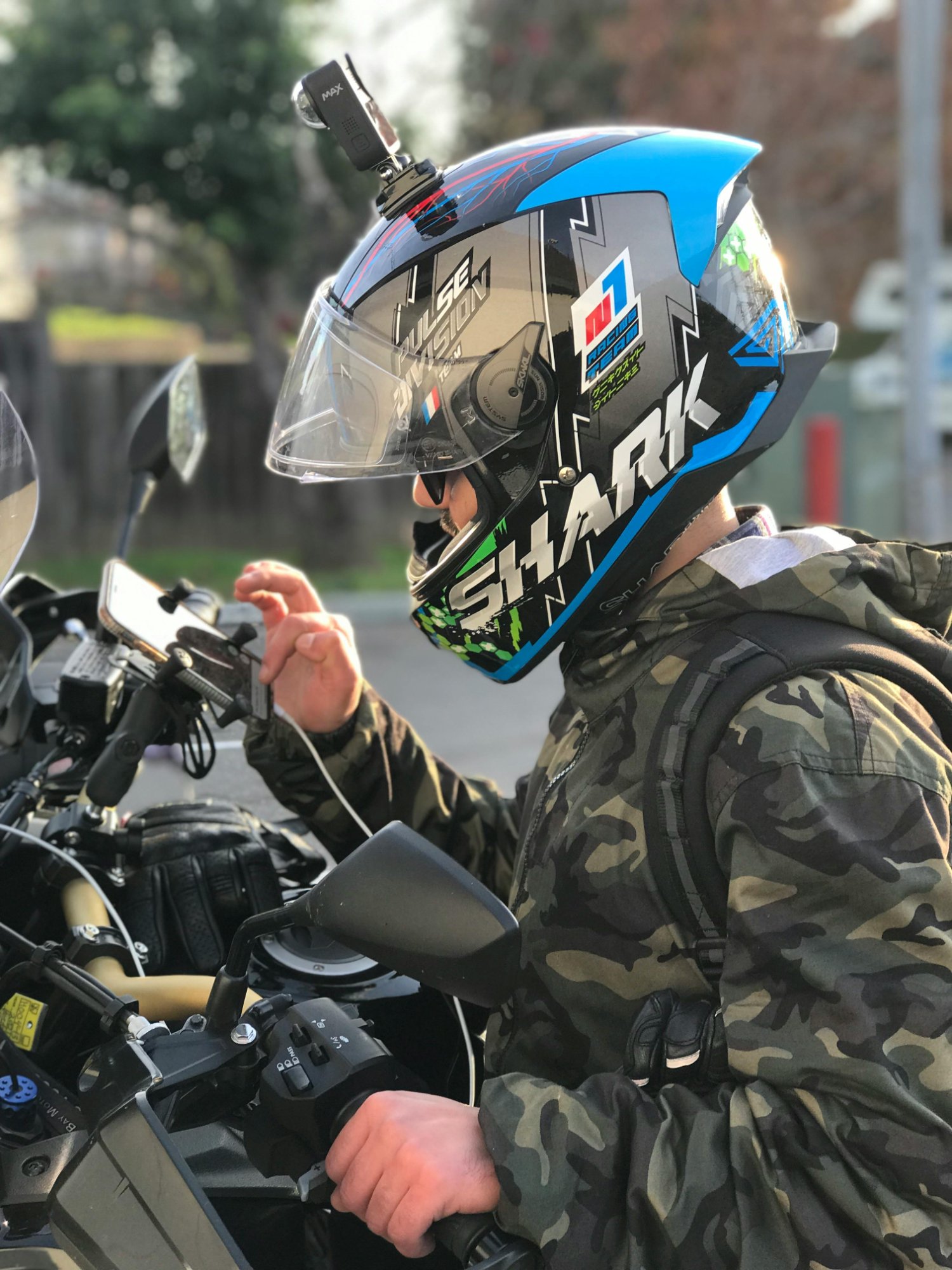 Rider with helmet using phone navigation